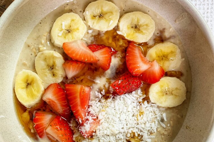 Bowl with cookie dough overnight oats with banana and strawberries