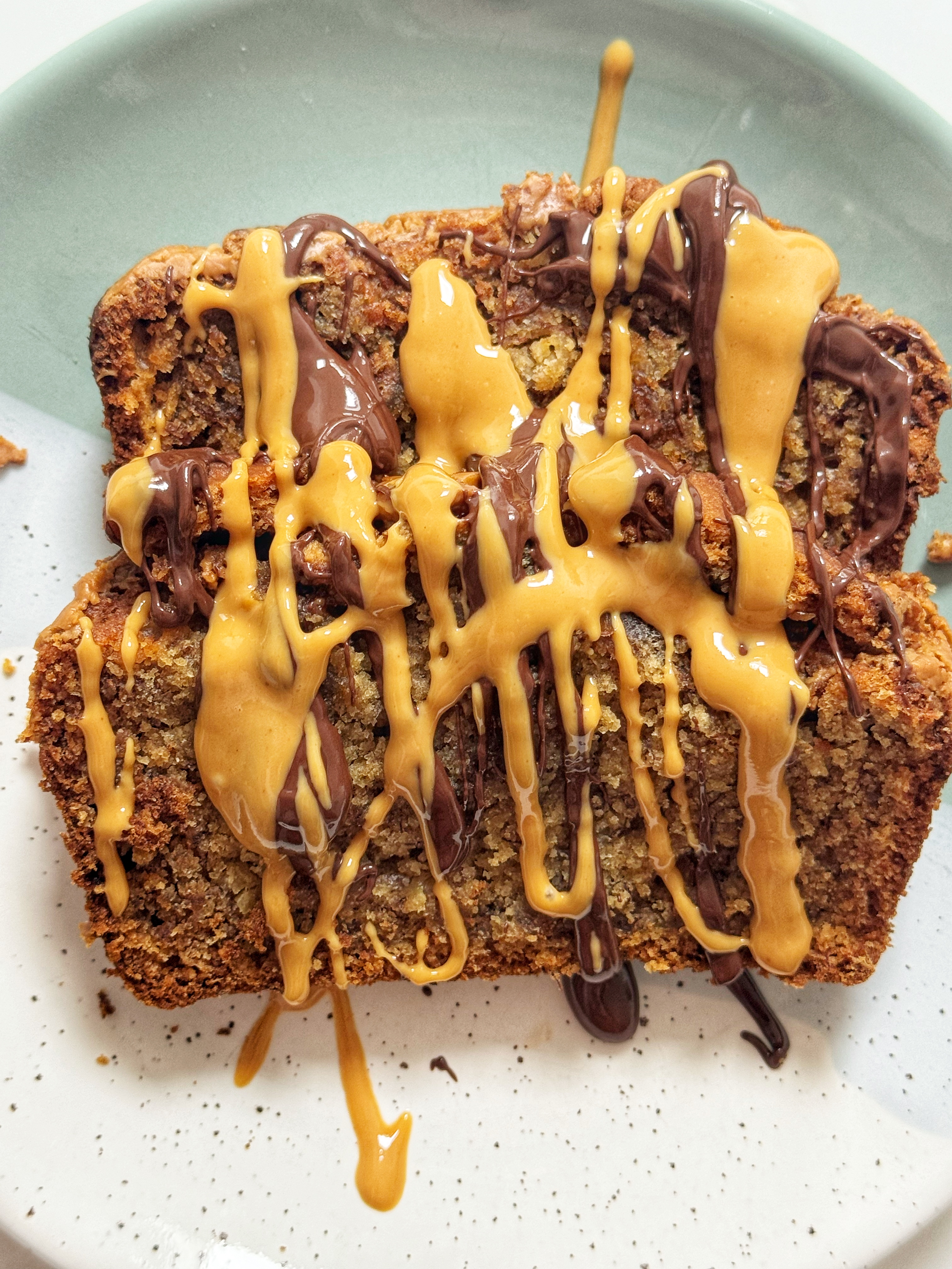 Biscoff Banana Bread served with melted chocolate and peanut butter