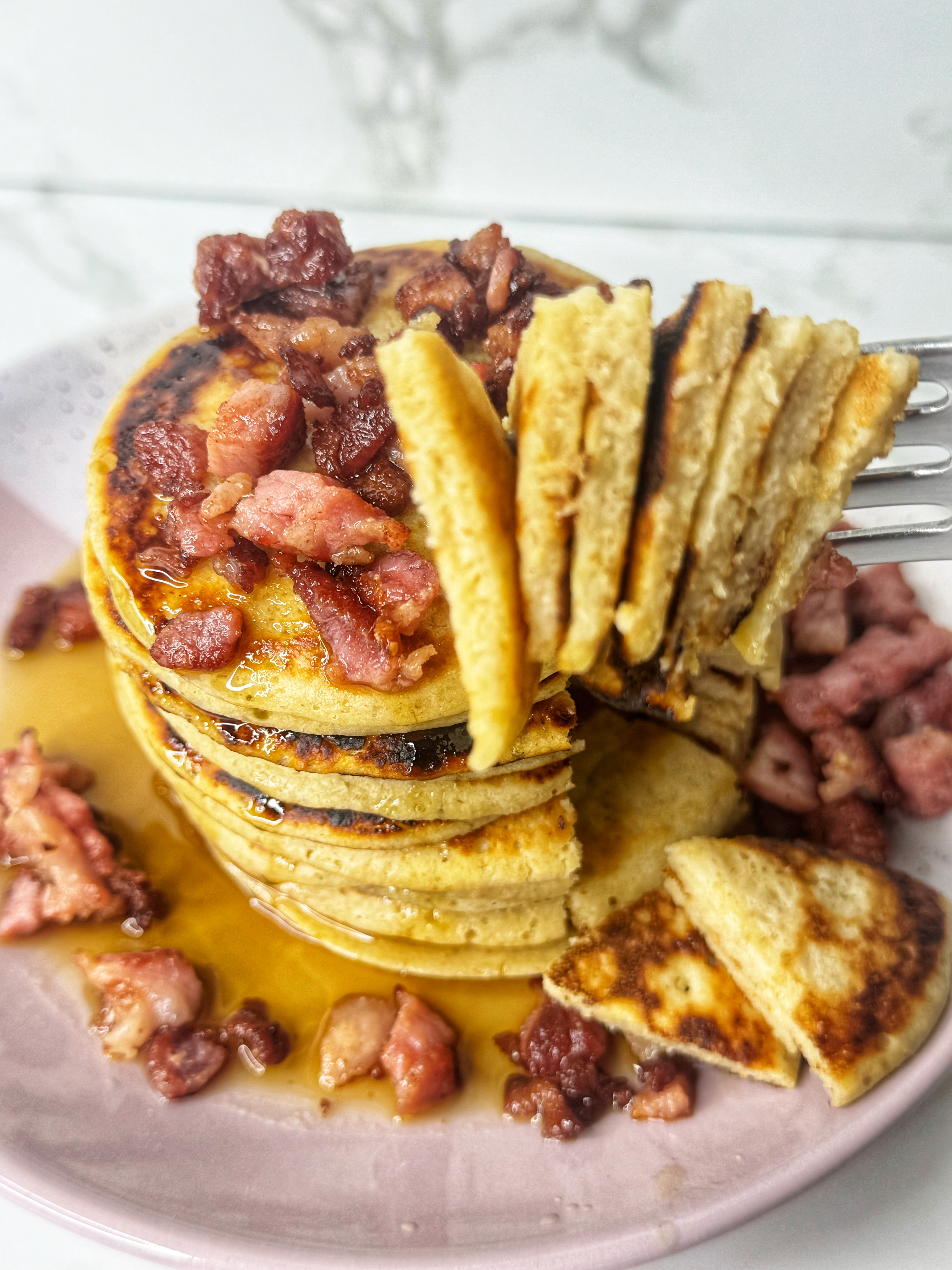 cottage cheese and oats pancakes served with bacon 