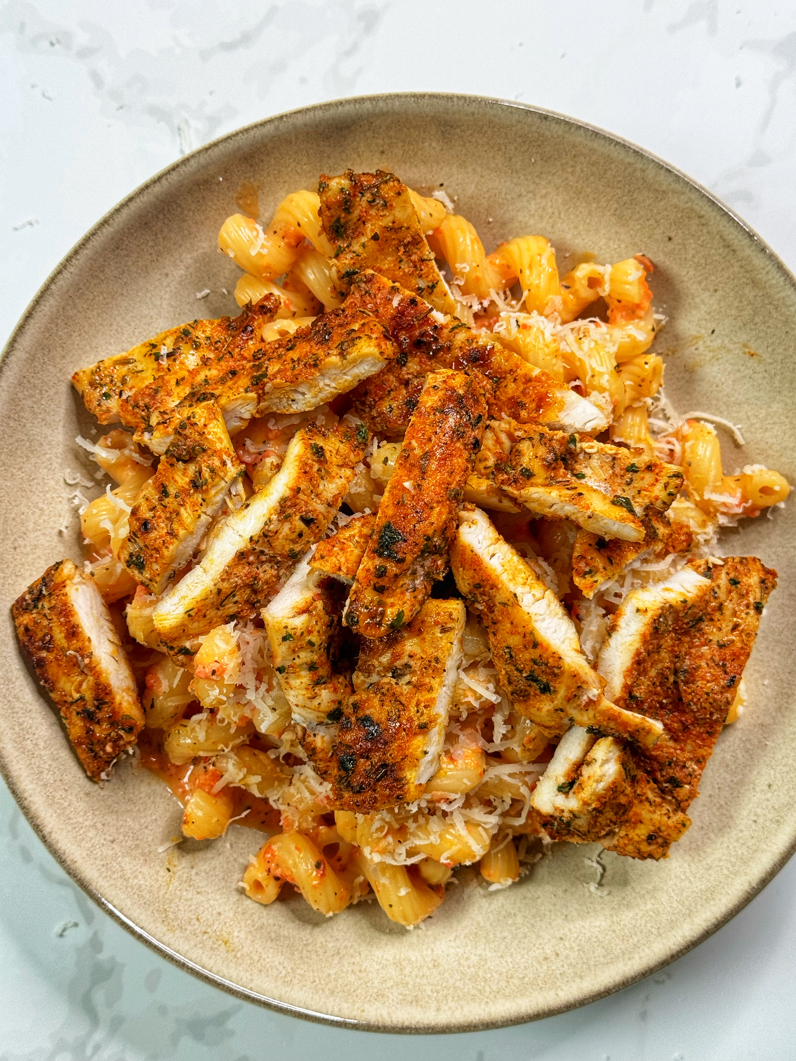 High protein roasted red pepper and ricotta cheese pasta with grilled chicken